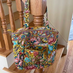 11” X 13”. Vera Bradley  10” handles.